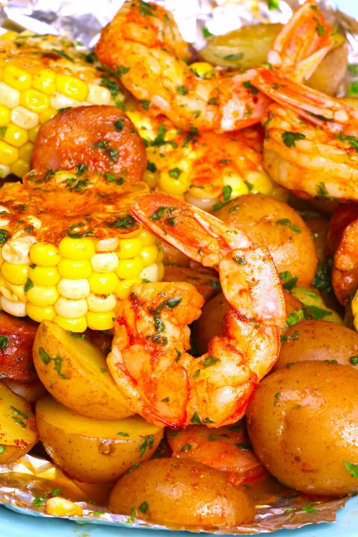 Shrimp Boil in Foil Packets - a delicious lunch or dinner idea made with jumbo shrimp, corn and potatoes wrapped in foil and baked