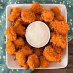 20 Minute Baked Popcorn Chicken – A healthier alternative to the deep-fried version that comes together in no time! All you need is only 3 ingredients: chicken breast, Doritos and mayonnaise. Baked crispy golden brown with the best Dorito crust! So good! Quick and easy dinner recipe. Video recipe.