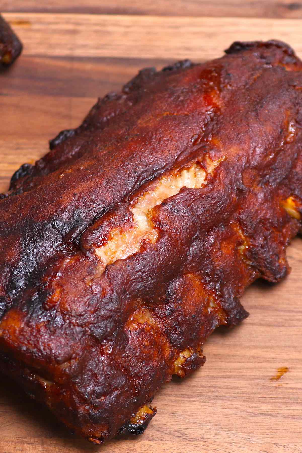 A rack of baby back ribs that have been smoked to perfection