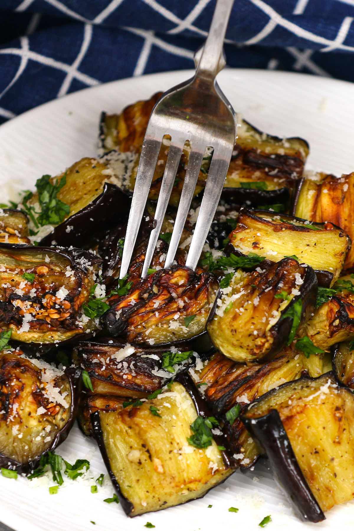 This Air Fryer Eggplant is a healthy and flavorful side dish that’s ready in under 20 minutes! Keep reading to learn how to roast eggplant in an air fryer quickly and easily.