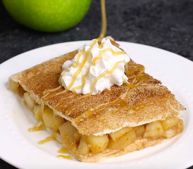 Closeup of a piece of sheet pan apple pie with a tortilla crust