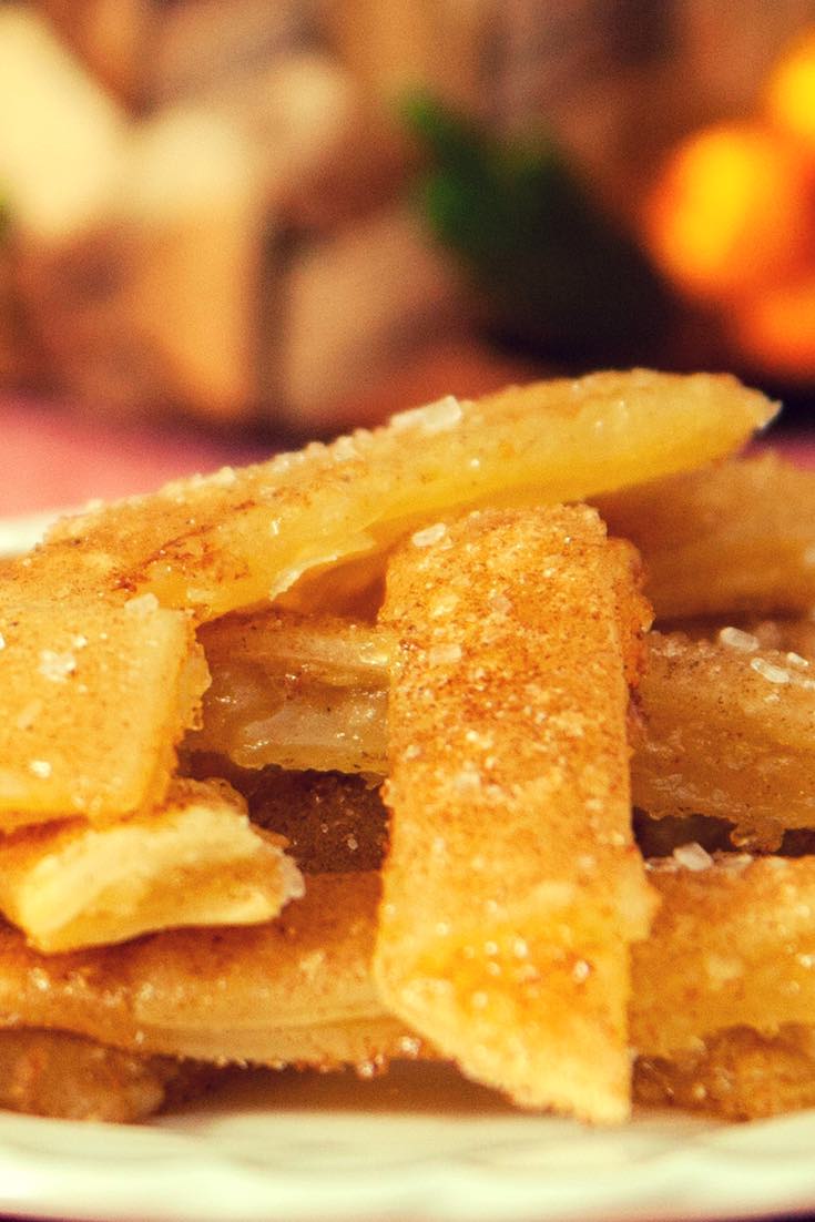 Delicious apple pie fries piled high on a serving plate