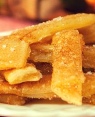 The Most Incredible Baked Apple Pie Fries: Delicious, crispy and healthy apple fries tossed with cinnamon sugar and baked to perfection golden brown color, drizzled with caramel sauce! All you need is a few simple ingredients: store bought pie crust, apple pie filling, cinnamon and sugar, nutmeg and milk. Quick and easy recipe, party desserts. Vegetarian. Video recipe.