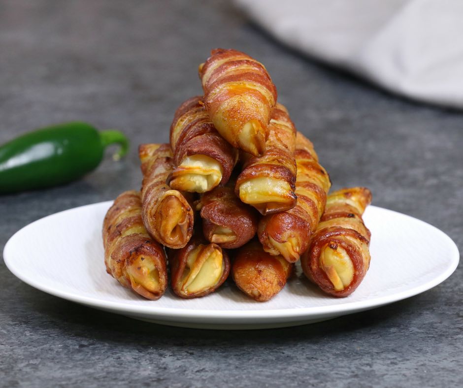 Bacon-wrapped Spring Rolls – filled with avocado, eggs, red onion, jalapeno, salt and pepper and wrapped in bacon, then baked until crispy. Easy to make for breakfast or brunch and great as a grab-and-go option for busy weekday mornings. Video recipe. AD