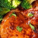 Baked Bone-in Pork Chops are juicy, tender, sticky and garlicky. They are full of flavor and really easy to make. The perfect and never-dry pork chops with restaurant quality can be easily achieved with a few simple tips.