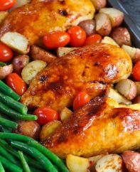 One Pan Baked Chicken With Potatoes, Green Beans and Cherry Tomatoes - Tender and juicy chicken breasts baked with vegetables in a sheet pan. A quick and healthy dinner that's super easy to make. It takes only about 30 minutes. Quick and Easy Dinner, healthy, Sheet Pan recipe.
