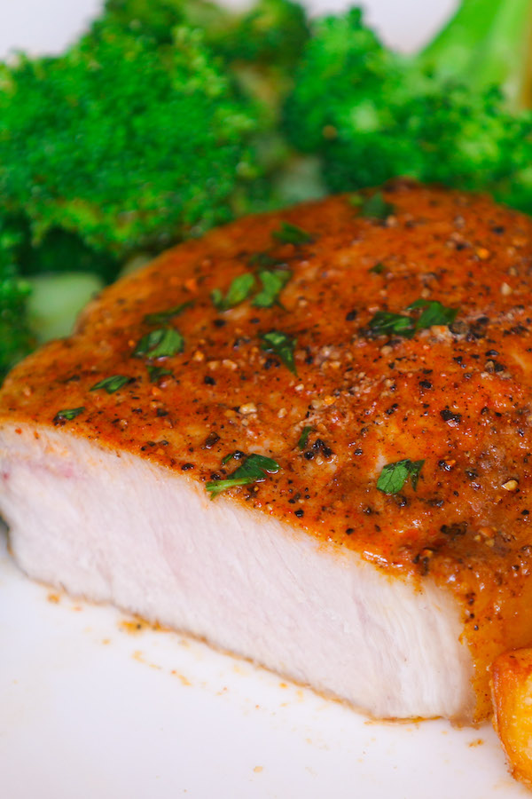 Cross-section of a boneless pork chop cooked to juicy and tender perfection