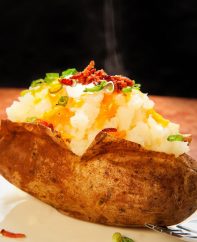 The perfect baked potato topped with toppings