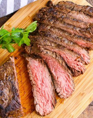 Slices of grilled bavette steak cooked medium with a warm pink color