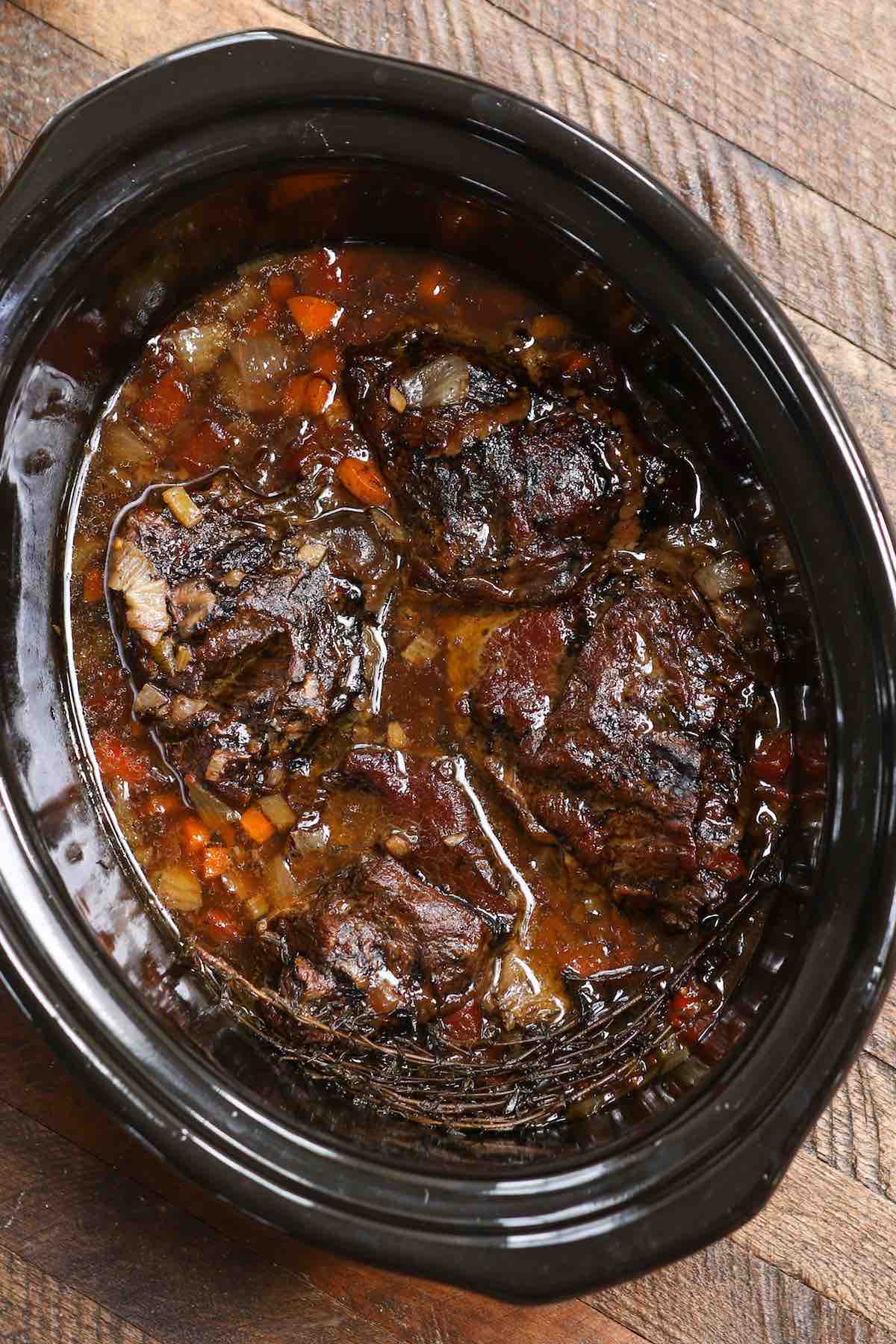 Slow cooked beef with vegetables in a crock pot
