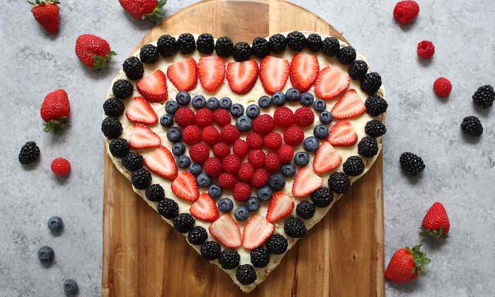 heart shape cake decoration with fruits