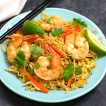 Authentic Pad Thai served on a plate with chopsticks