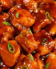 This Easy 20 Minute Bourbon Chicken is a copycat of the Chinese mall food classic: tender chicken coated in a tangy, sticky sauce with sweet and savory flavors. It’s an easy weeknight dinner that’s irresistible down to the last bite!