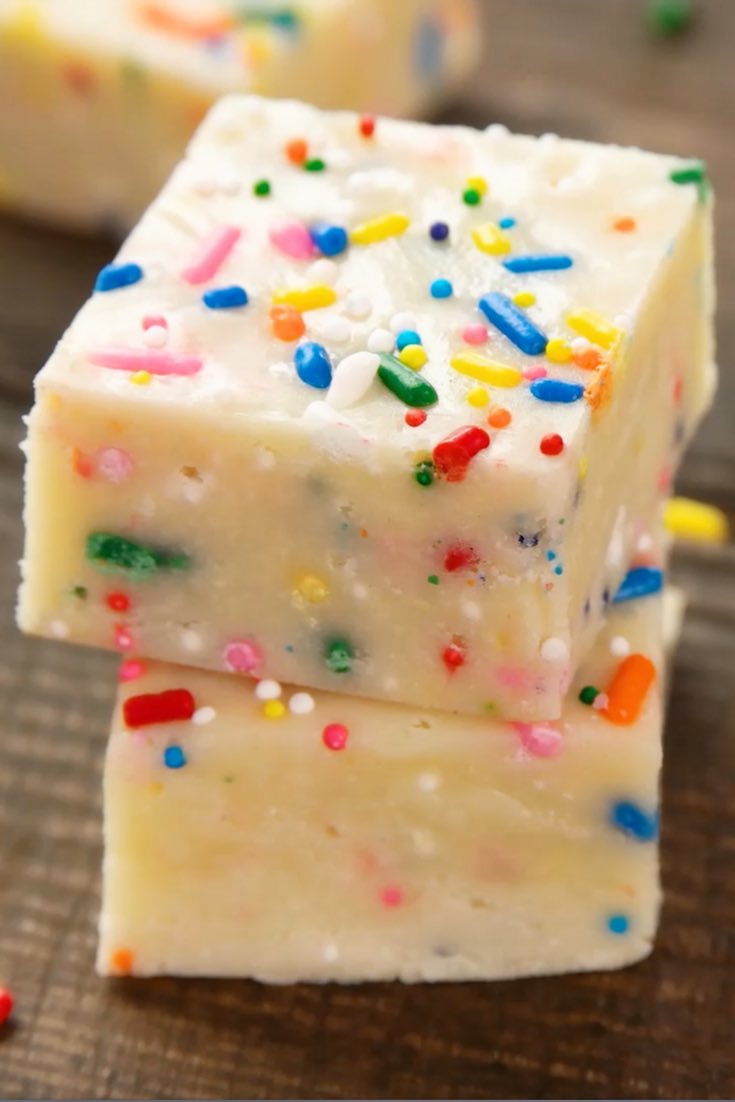 Cake Batter Fudge - Creamy and chocolaty, sweet and soft, with colorful sprinkles. All you need is a few simple ingredients: Cake mix, butter, white chocolate chips, condensed milk, vanilla extract and sprinkles! So Good! Home made gift recipes. Easy recipes for birthday or Mother’s Day. Vegetarian. Video recipe. | tipbuzz.com
