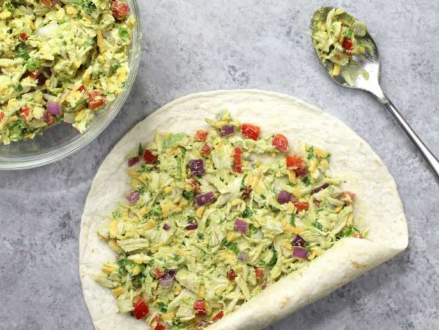 Wrapping up the chicken avocado filling with the tortilla