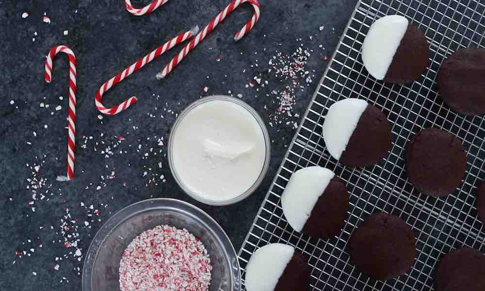 Dip each Chocolate Candy Cane Cookie into smoothly melted candy melts or white chocolate