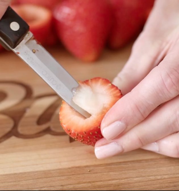 Hulling a strawberry to make a cavity for the filling