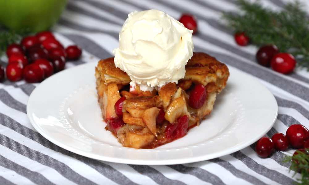 This Cinnamon Roll Apple Cranberry Pie recipe is an easy to make dessert that everyone will love