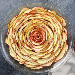 Wow your guests with this gorgeous and delicious Cinnamon Roll Apple Rose Tart. It’s so easy to make and are perfect for any party. Made with fresh apples. All you need is only 5 simple ingredients: cinnamon roll dough, red apples, lemon juice, brown sugar and butter. So beautiful! Quick and easy recipe. Vegetarian.