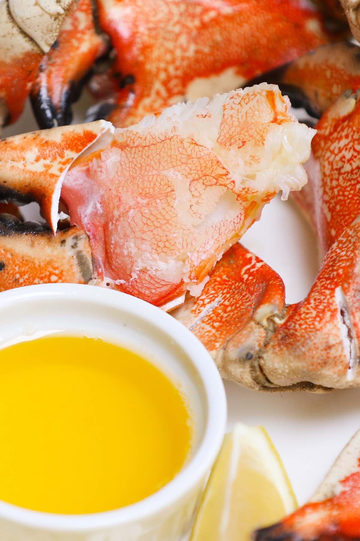Crab claws cracked open to show the fresh meat inside