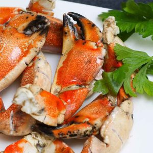 Boiled crab claws on a serving platter