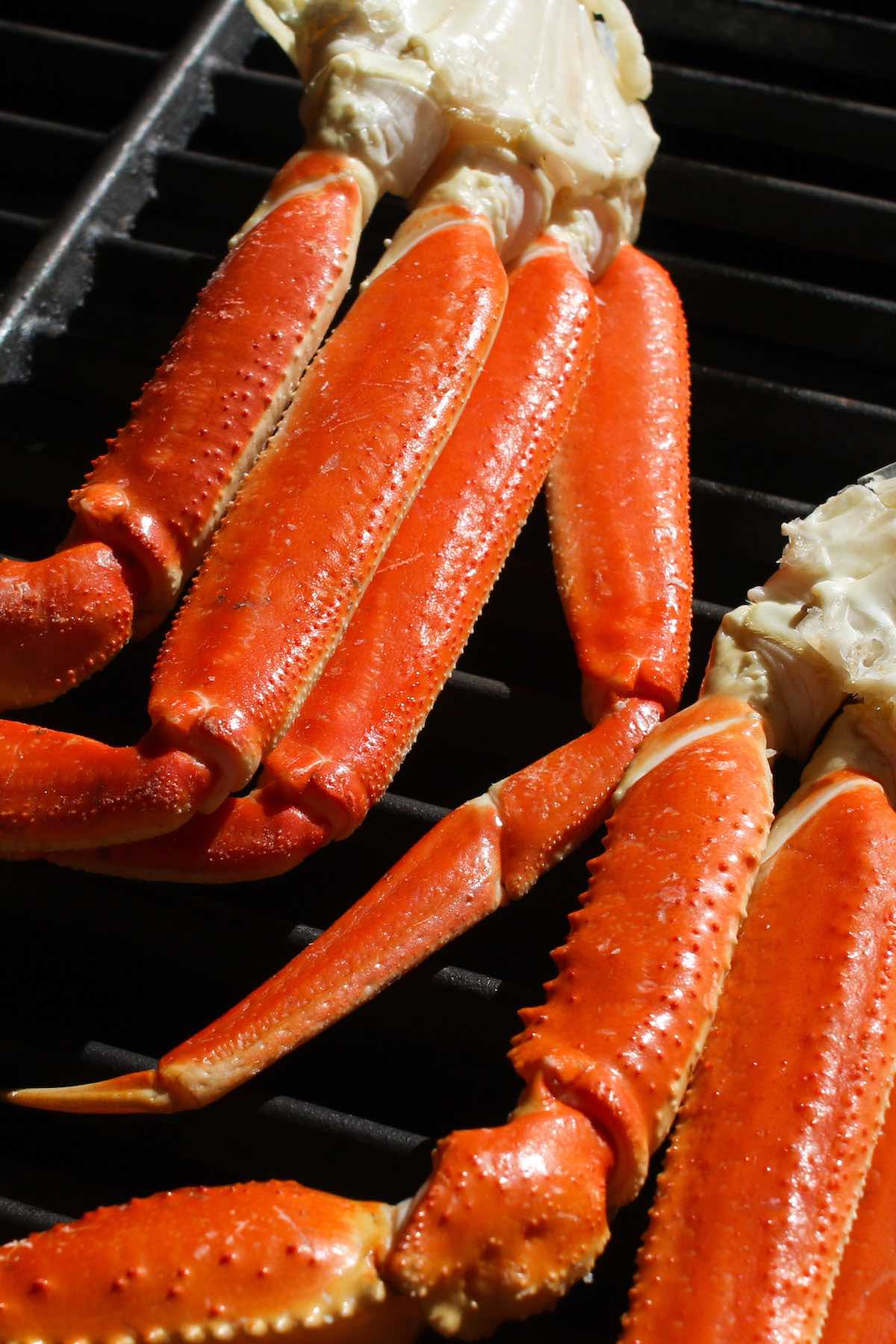 Making crab legs on the grill.