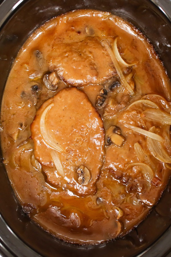 Braising in a slow cooker is the method of choice for cooking cube steaks as they are less tender cuts. The end result is tender and flavorful steaks that melt in your mouth. You have to braise your steak with a small amount of liquid, which helps it from drying out.