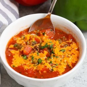 Serving a bowl of slow cooker stuffed pepper soup
