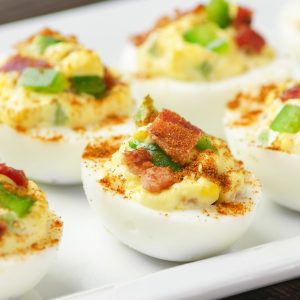 These Deviled Eggs with Bacon are the perfect appetizer for parties and holidays, featuring a smooth and creamy filling with crispy bacon on top. So good!