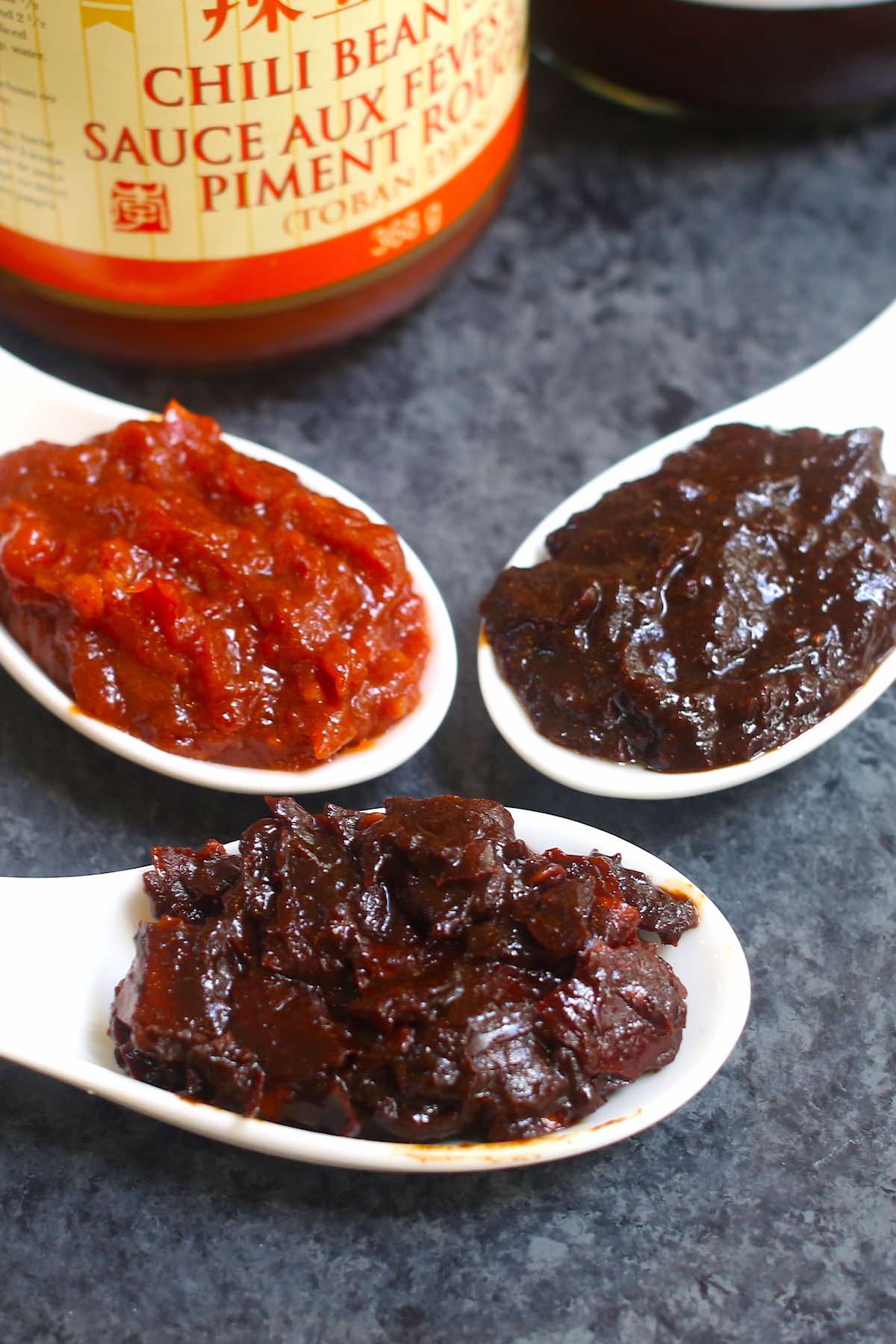 Doubanjiang is a Chinese bean paste with savory and sometimes spicy accents that makes many popular Chinese stir-fry recipes. Learn about the different types of Doubanjiang, how to use it, recommended brands, substitutes and more!