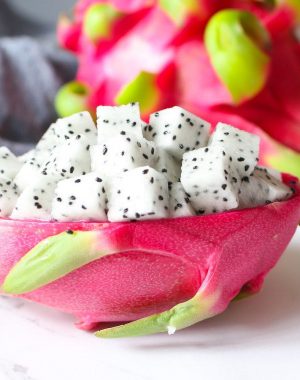Learn how to cut dragon fruit quickly and easily with this step-by-step guide. The sweet flesh is delicious and packed full of nutrients. You can eat dragon fruit on its own as a simple and refreshing snack or add it to fruit salads, smoothies, desserts and more!