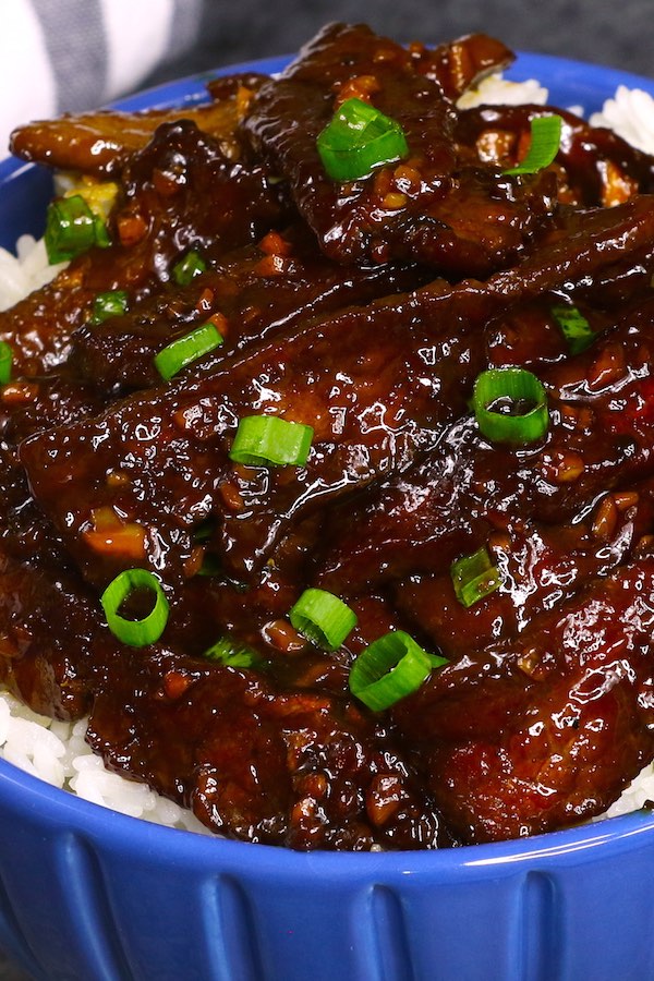 I will share with you some simple secrets for the tender and juicy Mongolian Beef. Just 3 easy rules: 1) select the right cuts; 2) Marinate with cornstarch + soy sauce; 3) Quick sear at high temperature. Amazingly easy for a quick weeknight meal with a few simple and basic pantry ingredients that you already have at home.