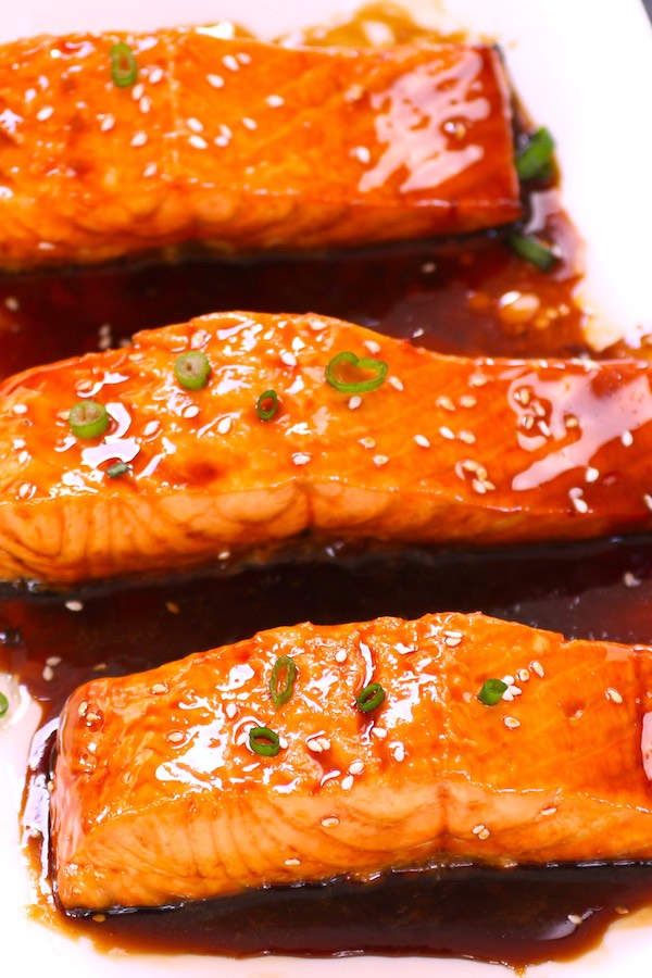 This Teriyaki Salmon is flaky, juicy and pan-fried to perfection with homemade Teriyaki Sauce. It’s the easiest, most flavorful teriyaki salmon you’ll ever eat. A healthy weeknight dinner option that’s ready in 20 minutes. Video recipe! #TeriyakiSalmon
