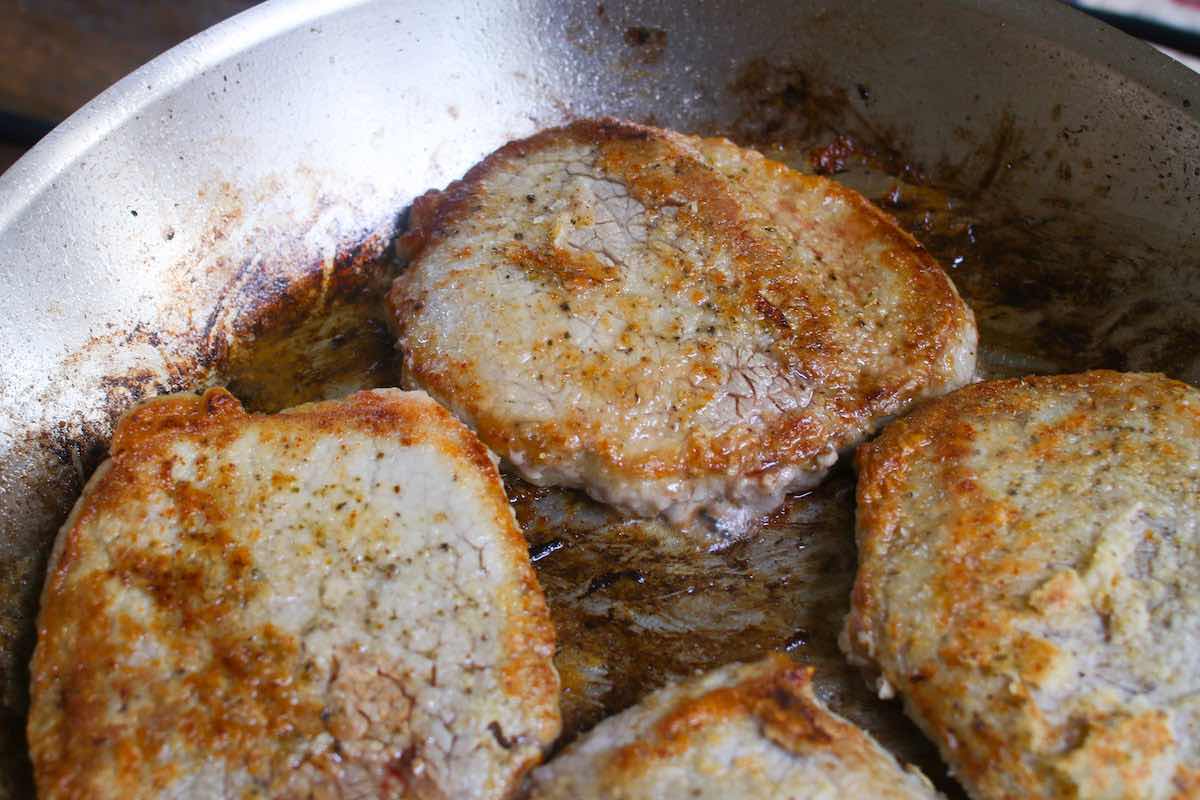 Sear the steak in oil until nicely browned.