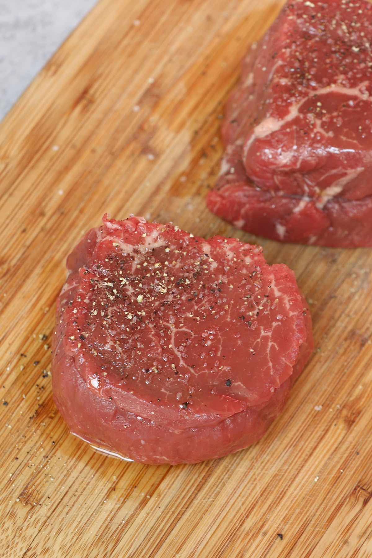 Filet mignon rubbed with oil, coarse salt and pepper before cooking