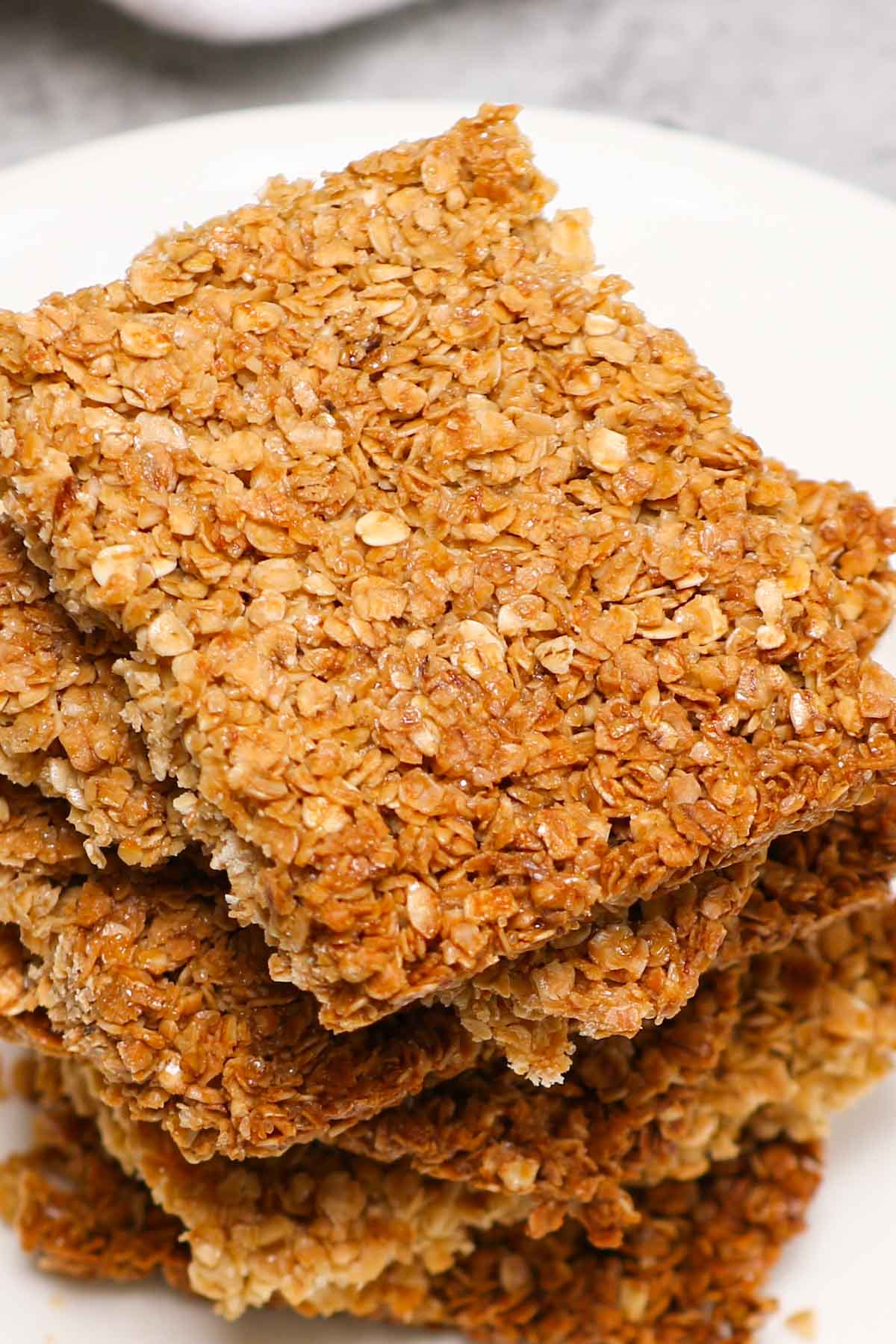 Closeup of freshly made British flapjacks on a serving plate