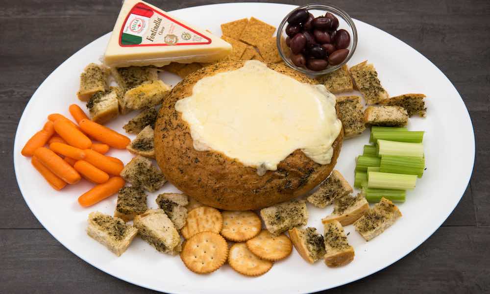 This Fondue Cheese Board is an easy way to host a holiday party