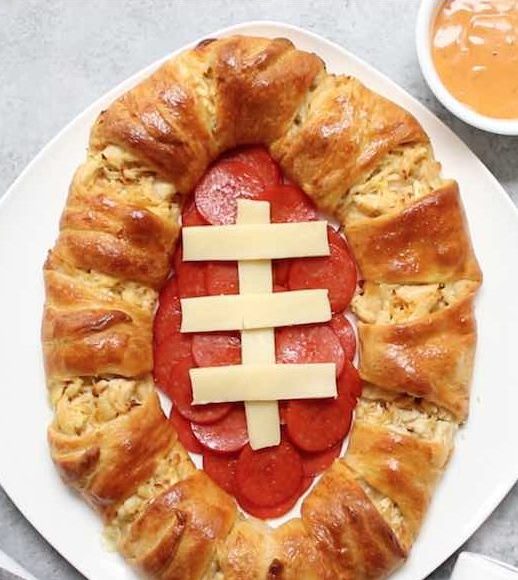 A homemade Chicken Crescent Ring with a Game Day theme