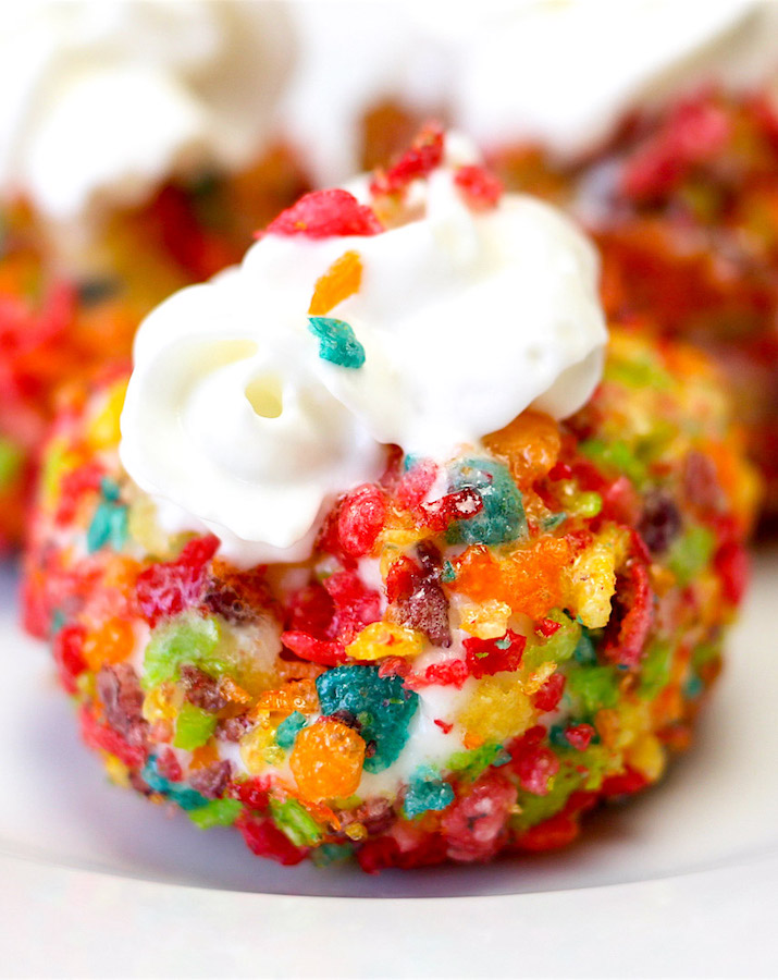 Homemade Fruity Pebbles Ice Cream deep fried to crispy perfection and garnished with whipped cream
