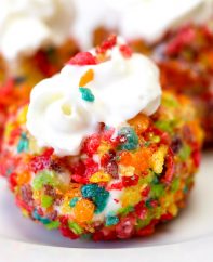 Fried Ice Cream is the most impressive and delicious way to end a meal! Creamy and sweet ice cream with a crunchy and colorful coating made from fruity pebbles! Fried Ice Cream is so easy to make with only 3 ingredients: Vanilla Ice Cream, Fruity Pebbles and Oil. Dessert, Easy recipe, tipbuzz.com #FriedIceCream