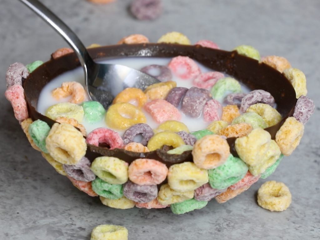 A Fruit Loops bowl being used with cereal and milk