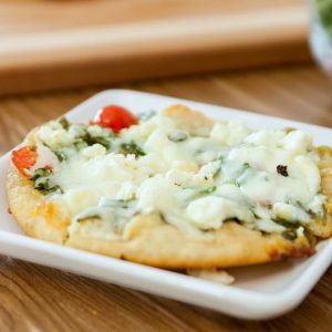 Pita Pizza is a vegetarian lunch or dinner idea that's quick and easy to prepare.