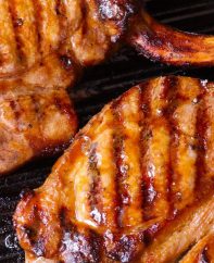 These Grilled Pork Chops are a surefire hit for any weeknight dinner or backyard BBQ, and they're easy to make with just 5 ingredients. Your entire family will love these tender and juicy pork chops!