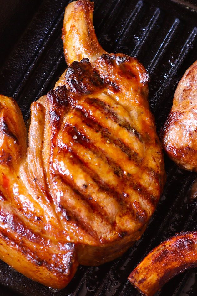 Grilled Pork Chops are tender and moist marinated pork chops grilled to golden perfection. Cook on a hot barbecue for a fast meal ready in under 30 minutes.