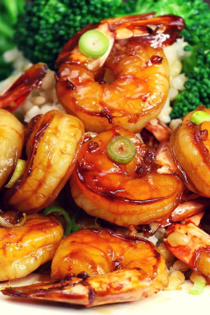 The easiest, most unbelievably delicious Honey Garlic Shrimp. And it’ll be on your dinner table in just 15 minutes. Succulent shrimp marinated in honey, garlic, soy sauce and ginger mix, seared in frying pan. Ready in 15 minutes! Quick and easy dinner recipe. Video recipe.