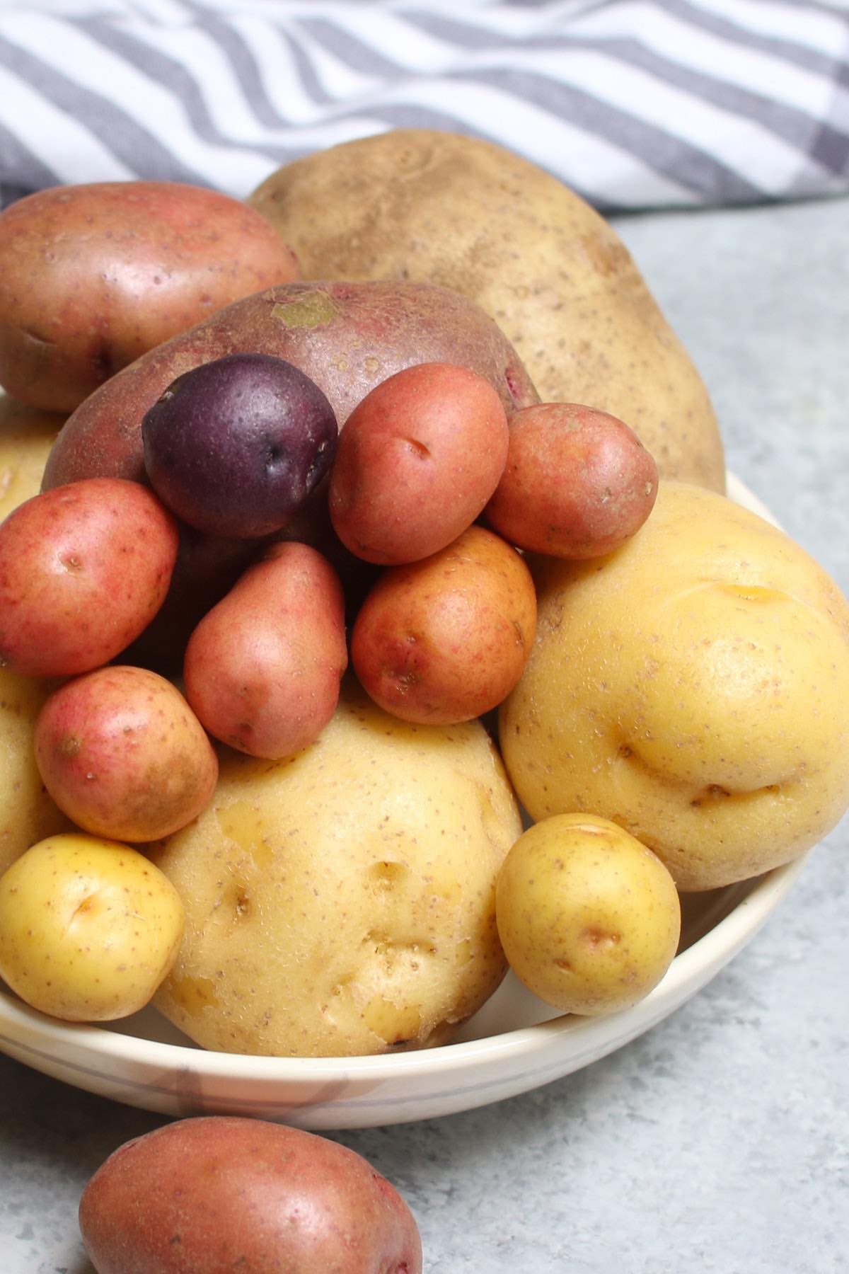 Varieties of potatoes incuding red potatoes, Yukon Golds, russets and baby potatoes