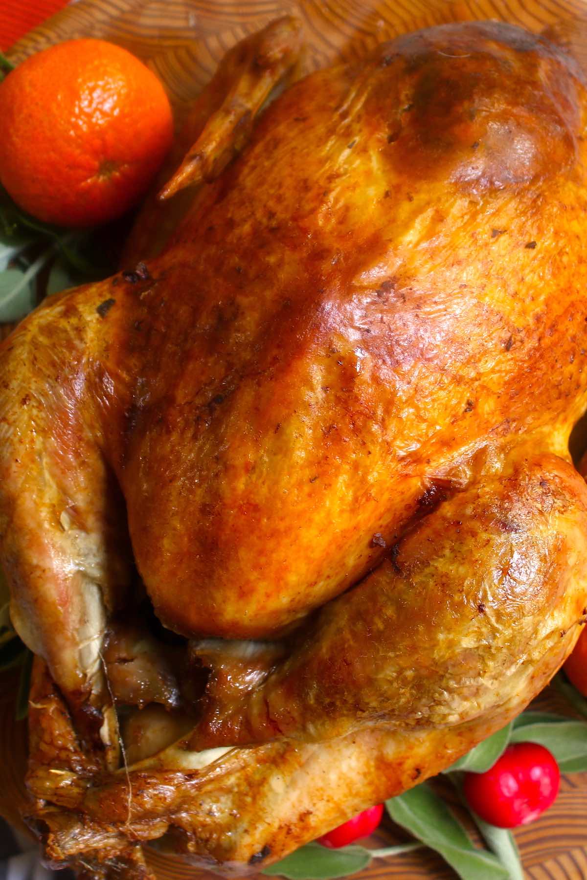 Learn how long to cook a turkey and get a perfectly cooked bird for your Thanksgiving or Christmas dinner! The rule of thumb is 15 minutes per pound, but turkey cooking time also depends on oven temperature, whether it’s stuffed or unstuffed, and thawed vs. frozen. 