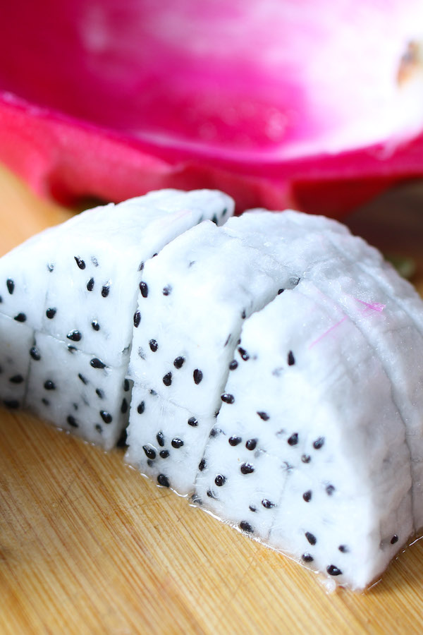 This photo shows how to cut up dragon fruit into cubes for fruit salad
