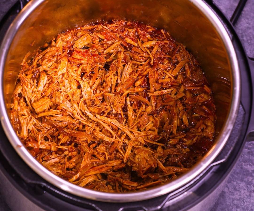 Instant Pot Pulled Pork in the Instant Pot after pressure cooking