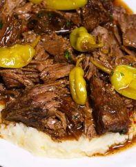 Instant Pot Mississippi Roast is a comforting dinner that even picky eaters will devour. The chuck roast is fall-apart tender with a flavorful gravy.